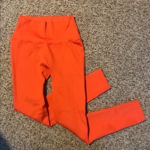 Balance Athletica orange linear leggings size small
